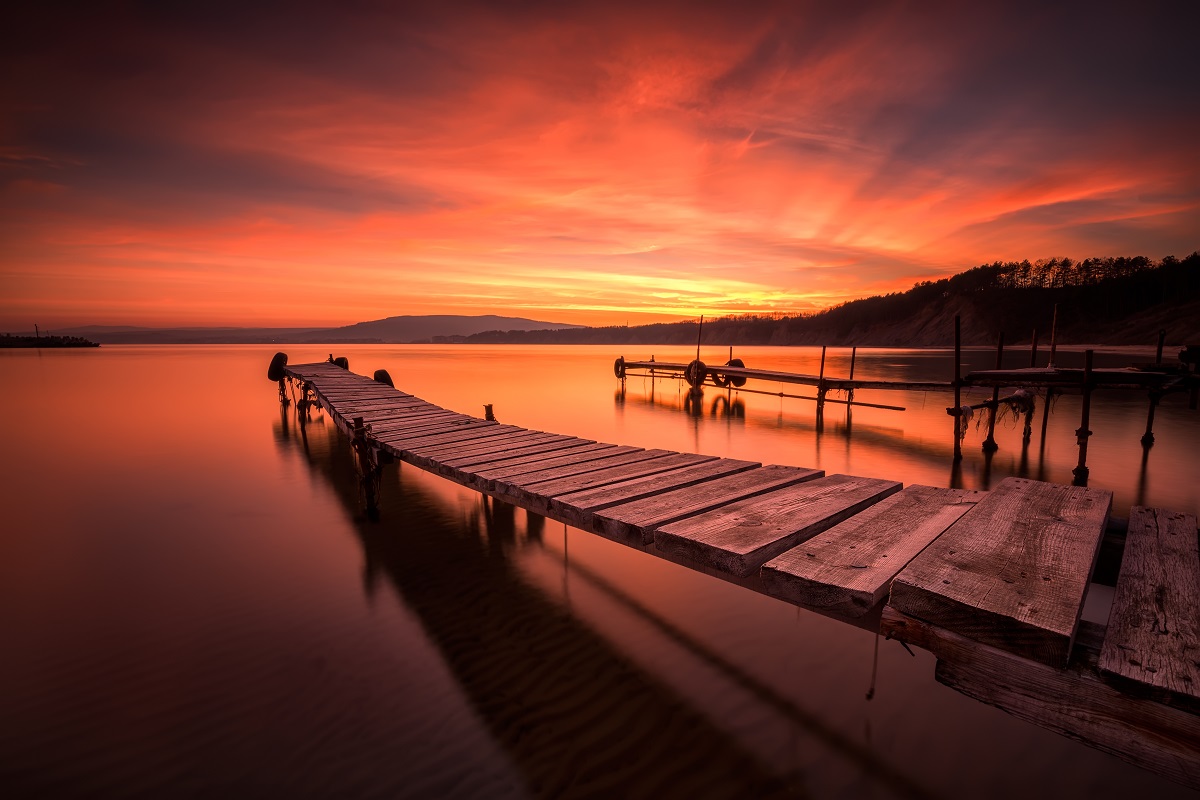 Sunset at a wooden dock