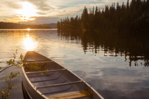 Frenchman Lake Yukon Canada canoe sunset scene