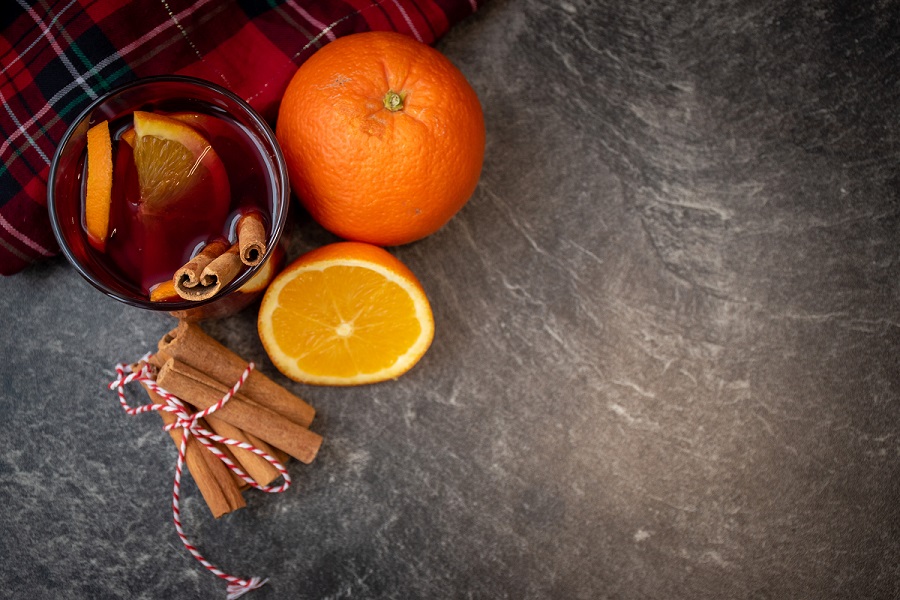 Mulled wine garnished with orange and cinnamon